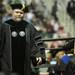 Dr. Jeffrey Cohu, walks back to his seat after recieving his doctrate of education, during commencement at the Convocation Center in Ypsilanti, on Sunday, April 29, 2012. For annarbor.com By: Joe Sharp